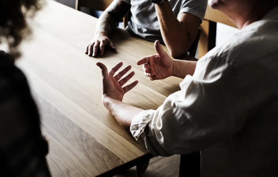 Group of friends talking, gesticulating